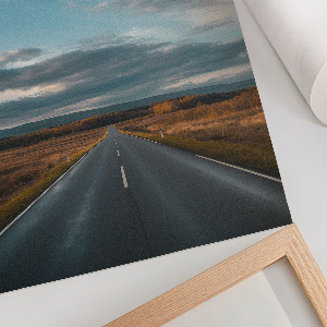 Wall art depicting a roadway landscape