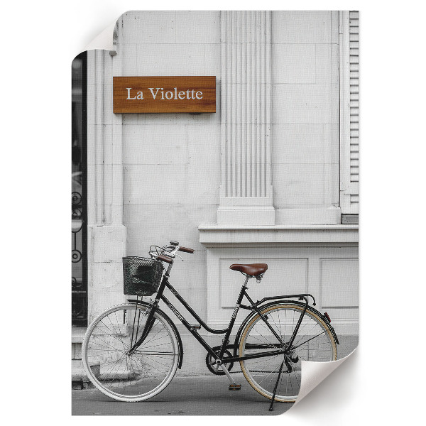 Decorative poster showing a bike leaning against a wall