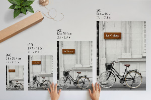 Decorative poster showing a bike leaning against a wall