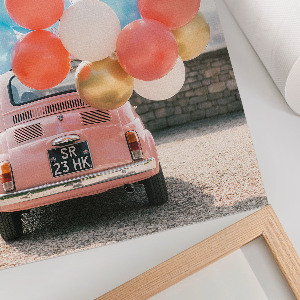 Poster featuring a car with balloons