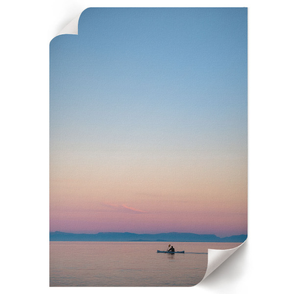 Decorative poster featuring a kayak at sunset