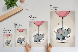 Wall print featuring an elephant holding a balloon