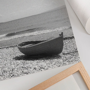 Poster showing a beach scene with a boat