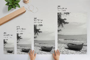 Poster showing a beach scene with a boat
