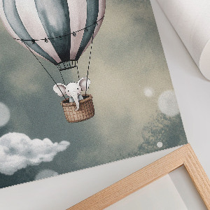 Wall art featuring an elephant in a balloon