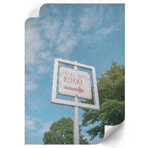 Wall art with a directional sign motif