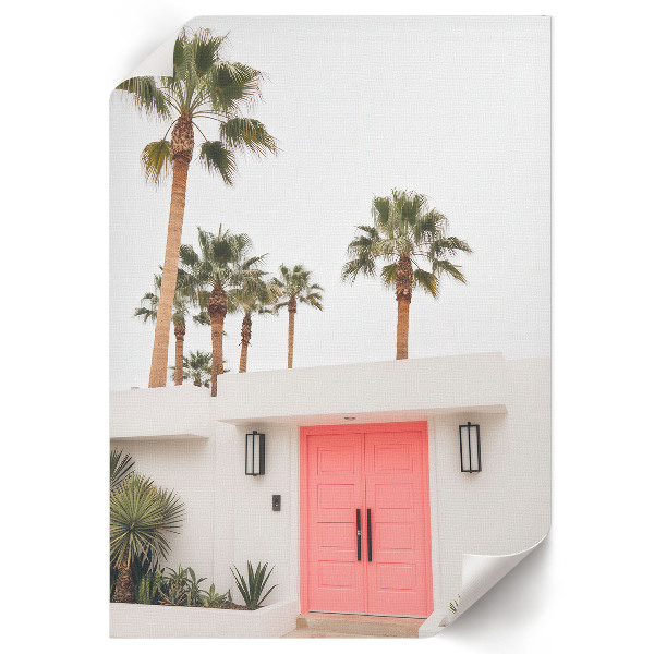 Wall art with palm trees printed on a door