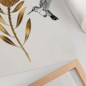 Wall art featuring a hummingbird and a flower