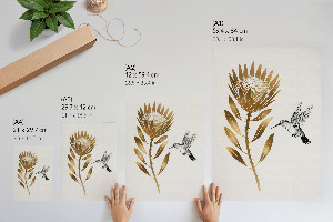 Wall art featuring a hummingbird and a flower