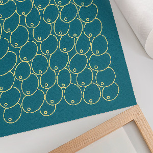 Wall art featuring sculptural breast shapes