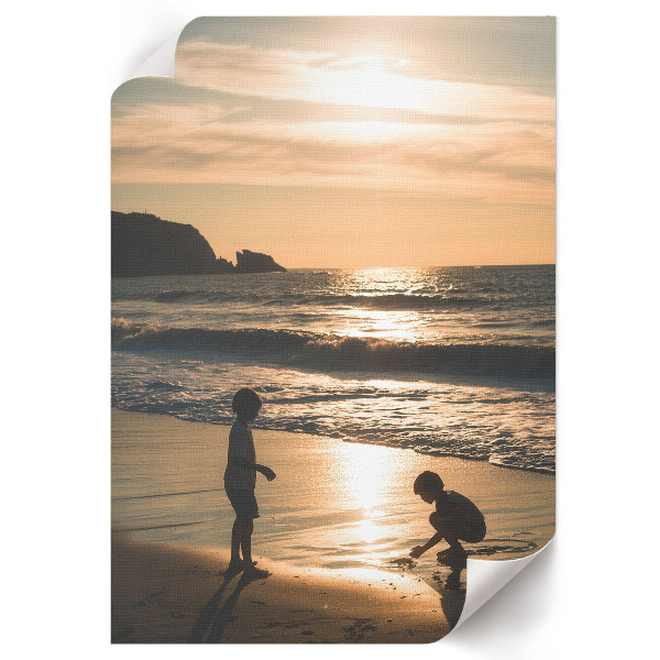 Wall art depicting children on the beach
