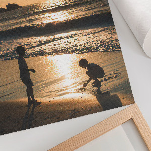 Wall art depicting children on the beach