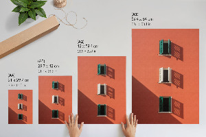 Wall art featuring an orange building facade