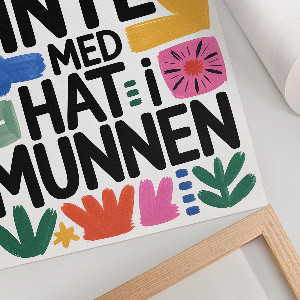 Wall art featuring text and colorful design