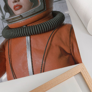 Wall art depicting a woman in a spacesuit