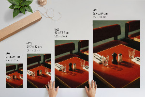 Wall art showing a table in a restaurant