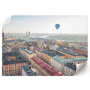 Modern wall art poster depicting a balloon over the city