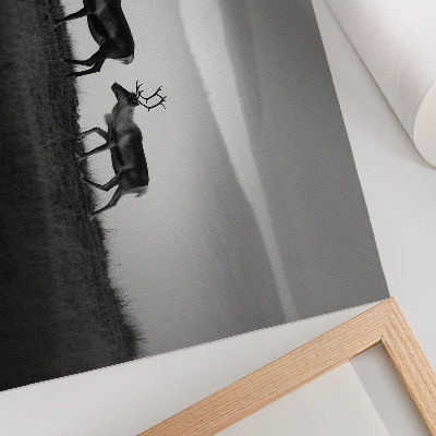 Canvas poster with a reindeer in a natural landscape