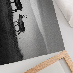Canvas poster with a reindeer in a natural landscape