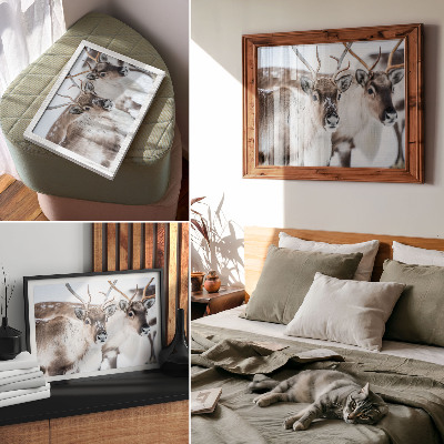 Wall poster featuring a reindeer in a winter scene
