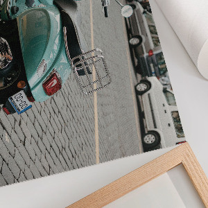 Wall poster showing a turquoise scooter