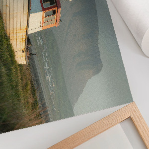 Canvas poster showing a boat on the shore