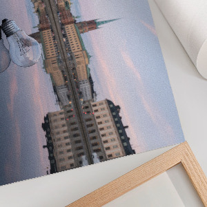 Premium wall art depicting a light bulb and a cityscape