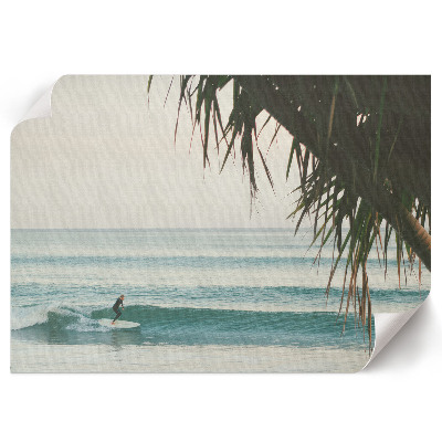 Surfer on a wave wall poster