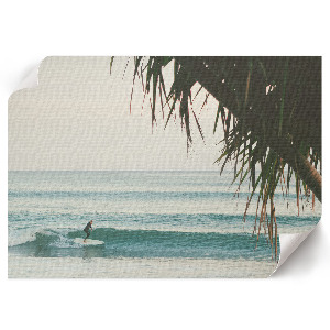Surfer on a wave wall poster
